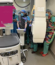 doctors performing robotic bronchoscopies