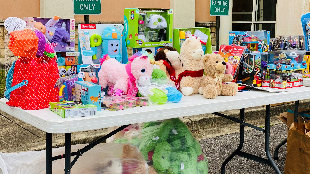 This is a photo of donated toys on a table.