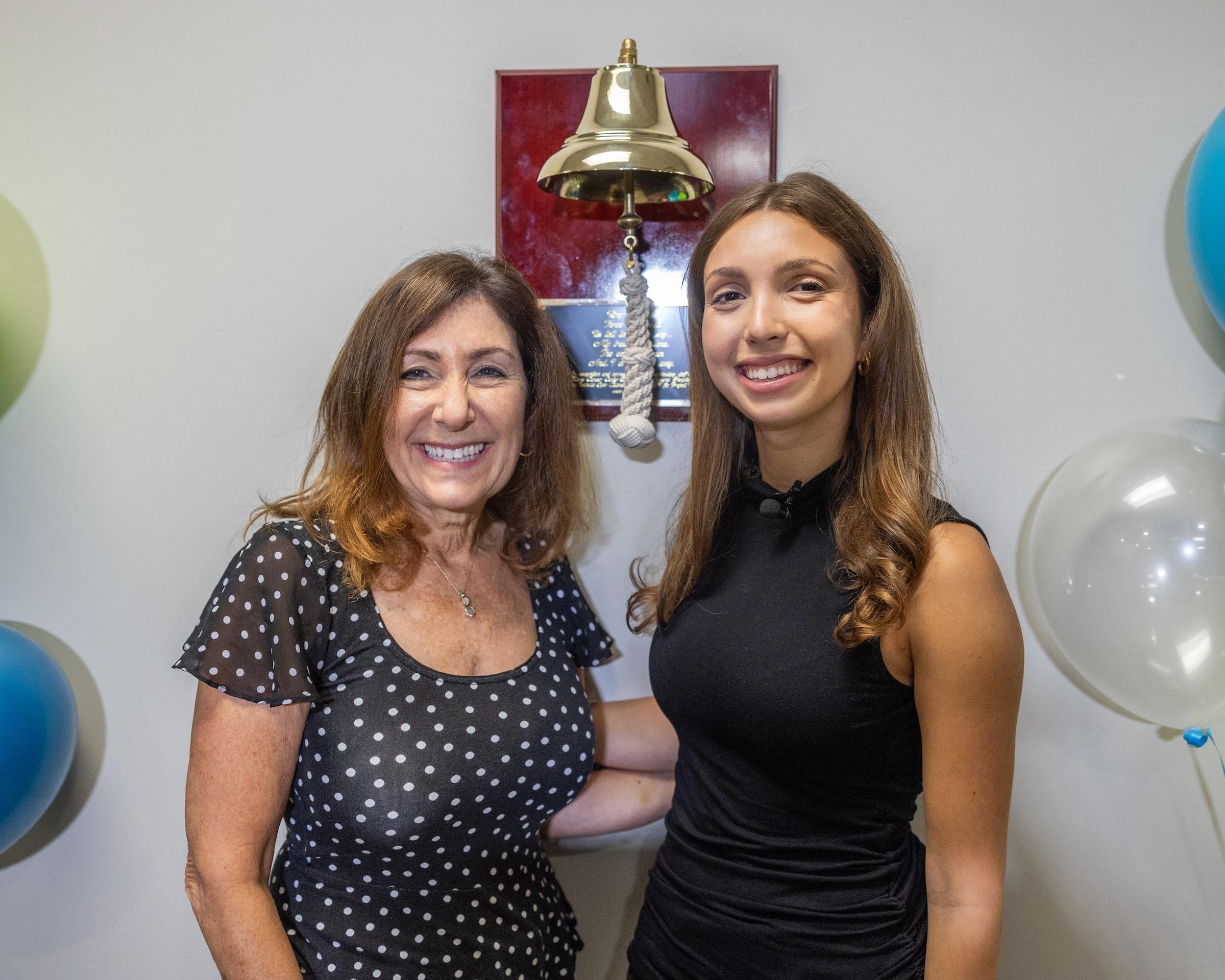 Isabella Spar & Wendy Jeshion stand in front of the donated bell