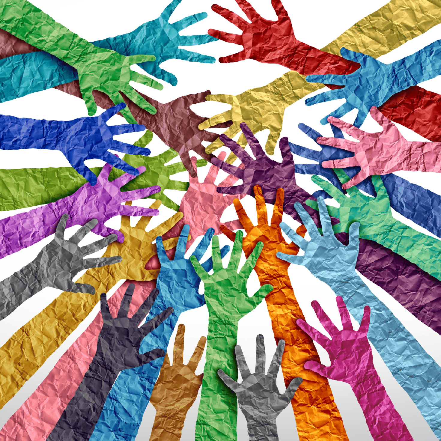 A bunch of multicolored paper hands reach towards each other