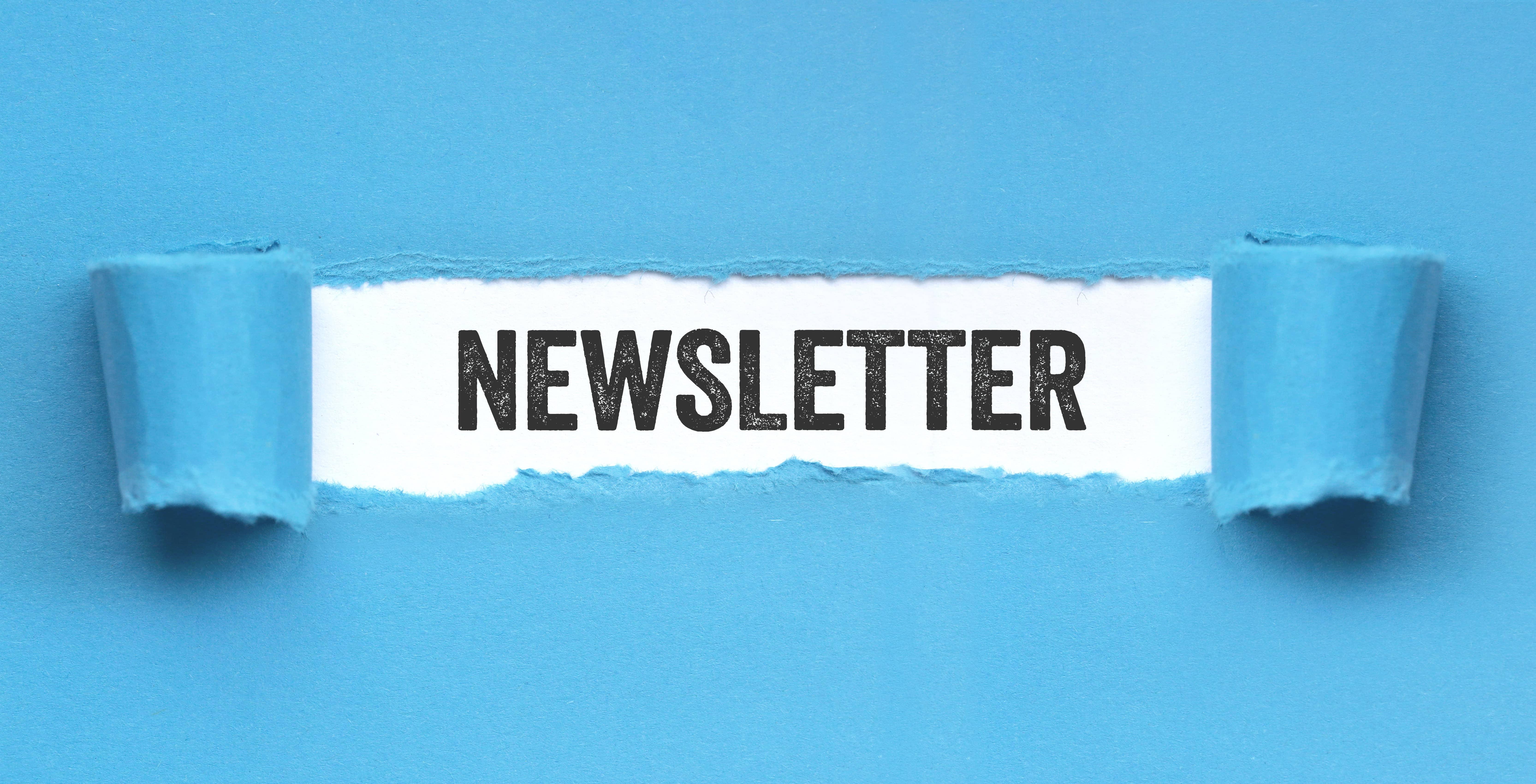 a blue page with a ripped out middle which says Newsletter underneath