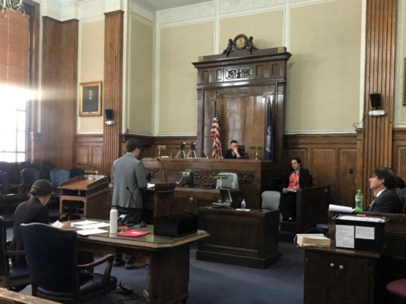 This image shows people in a courtroom