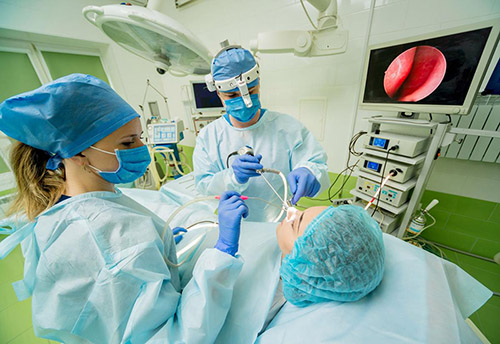 Patient having procedure in Otolaryngology