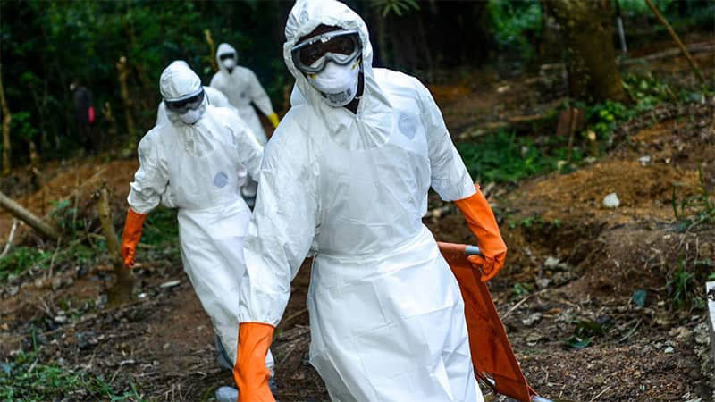 Ebola workers in protective equipment