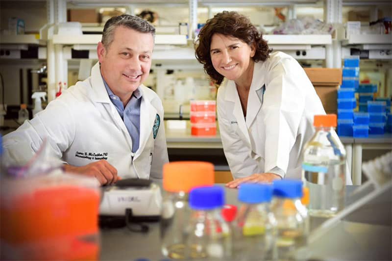 James McLachlan, PhD and Lisa Morici, PhD in lab