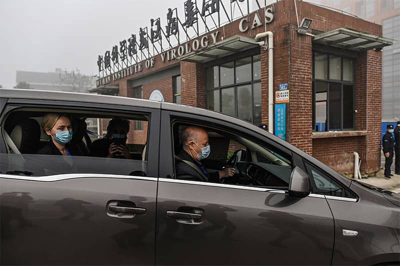 Members of the World Health Organization team arrive at the Wuhan Institute of Virology in Wuhan, China