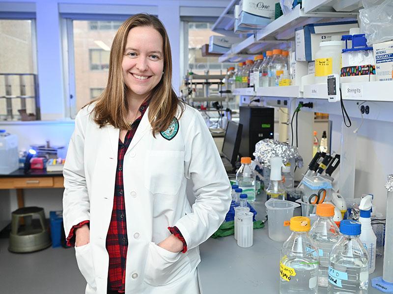 This is a photo of Dr. Elizabeth Norton in a lab