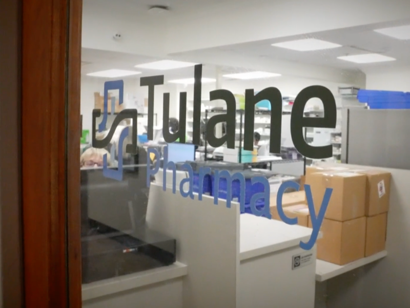 This image shows the door of the Tulane Pharmacy located in the Hutchinson building