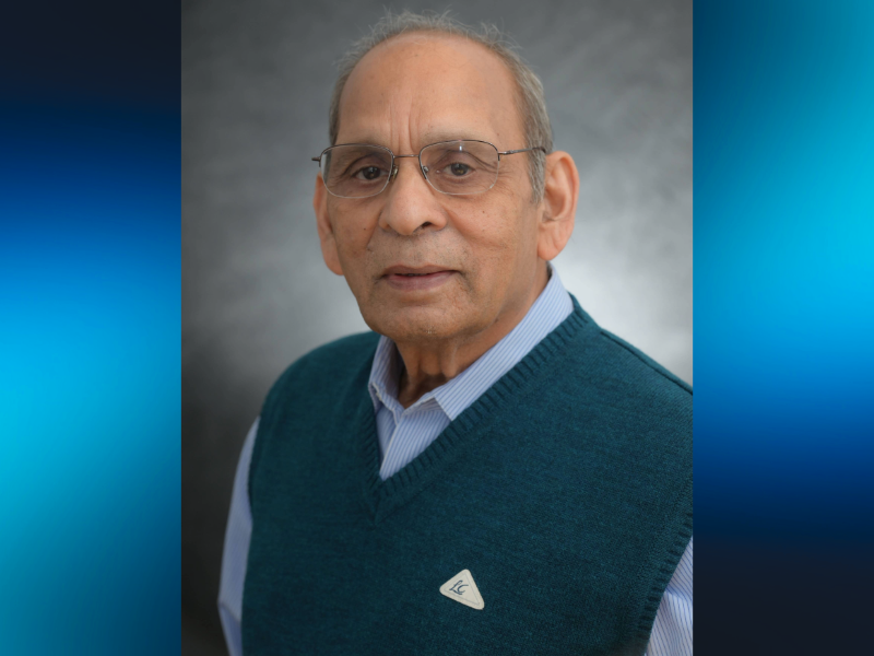 A profile picture of Kailash Pandey. He's wearing glasses and a green vest over a blue button up shirt