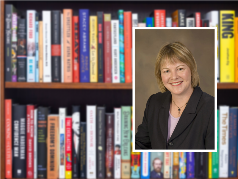 A portrait of Heddwen Brooks inset with a filled bookcase.