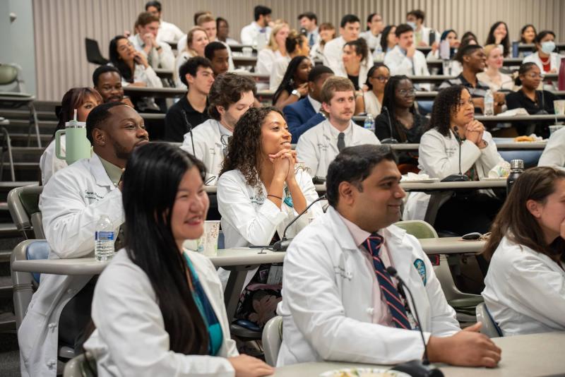 a group of doctors at a confernece
