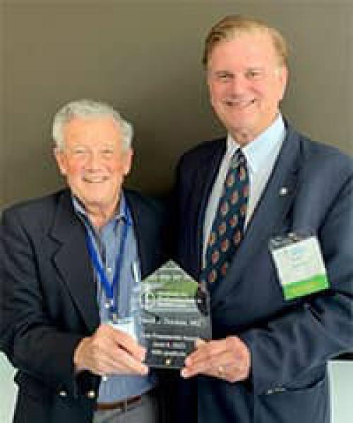 Dennis Novack, MD presents 1st Presidential Award to David Doukas, MD
