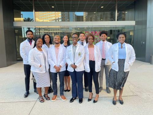 SNMA Leadership 2024 SNMA eboard leadership in their white coats