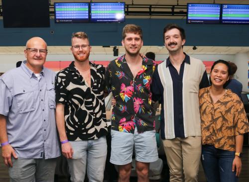 five people in bowling shirts