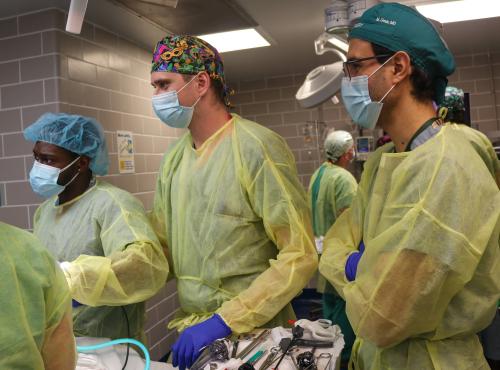 three doctors operating