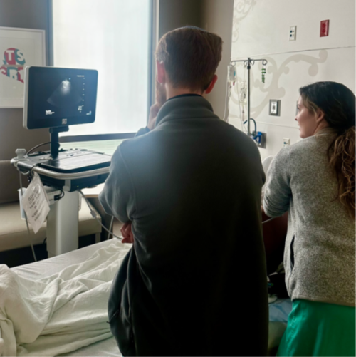 Tulane IM residents practice with a point-of-care ultrasound (POCUS) machine Tulane IM residents practice with a point-of-care ultrasound (POCUS) machine