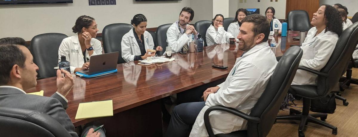 a group of doctors laughing