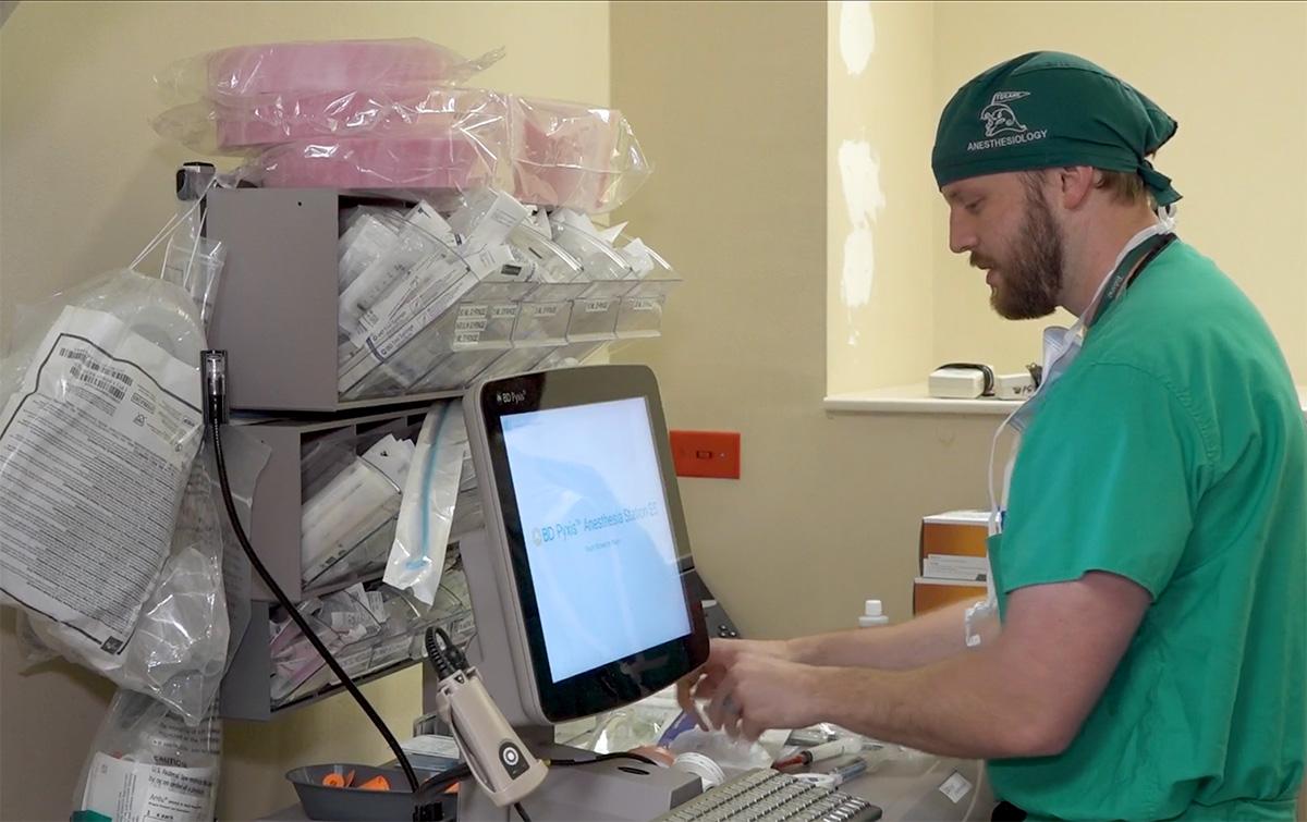 anesthesiologist working on computer