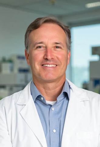 Chad Roy in a lab coat