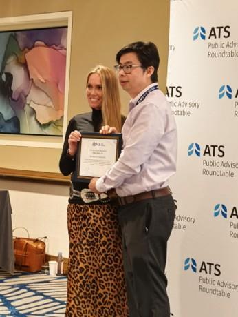 Zhen Zheng receives award at the ATS Public Advisory Roundtable
