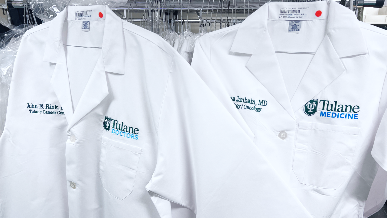 This photo shows two white doctors coats