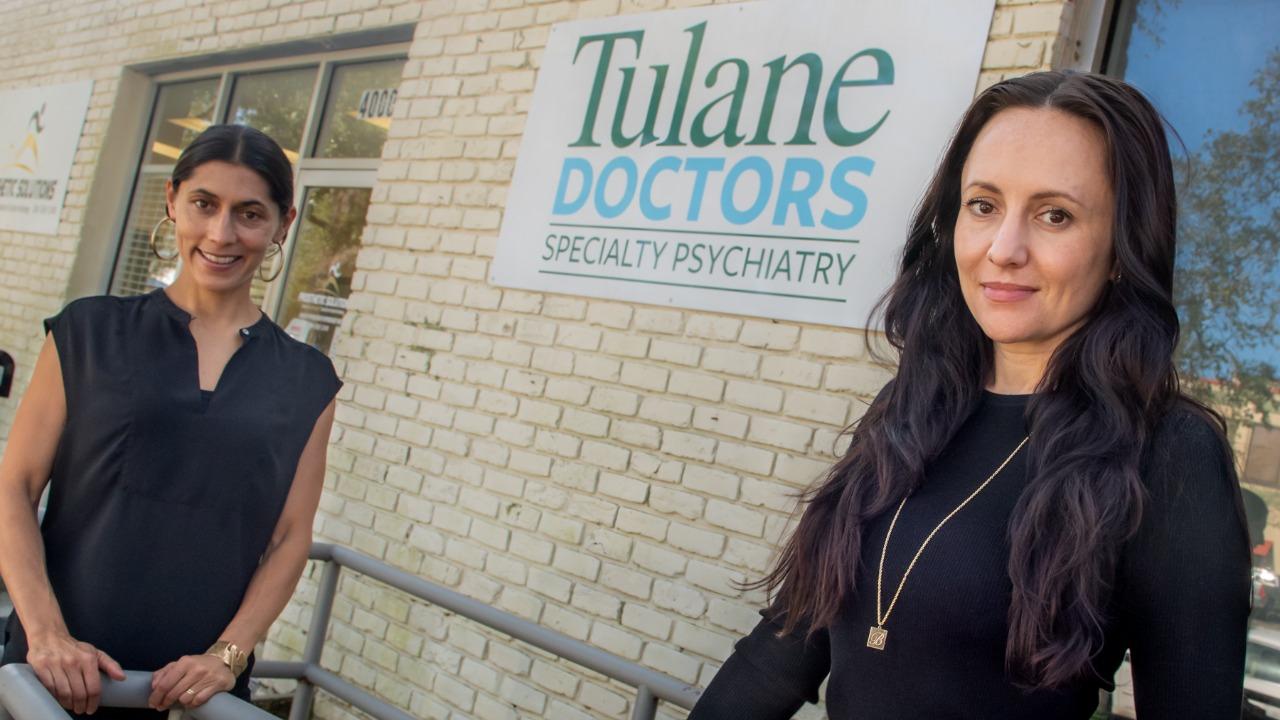 This photo shows Serena Chaudhry and Ashley Weiss standing outside the Tulane Doctors Specialty Psychiatry Clinic.