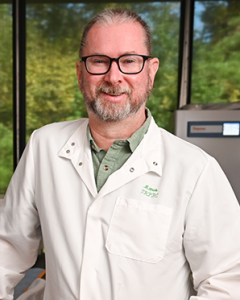 Andrew Maclean profile picture, man in glasses and a lab coat