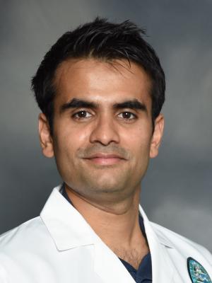 Aneesh S. Dhore, MD