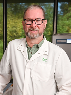 Andrew Maclean profile picture, man in glasses and a lab coat